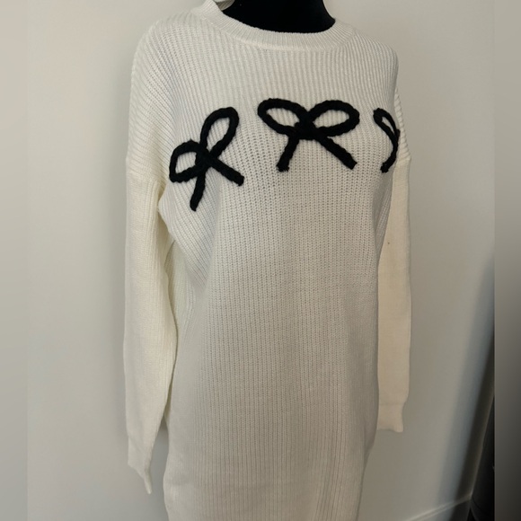 Dreamers by debut knit sweater dress with black bow detail. Size medium. - Picture 4 of 5